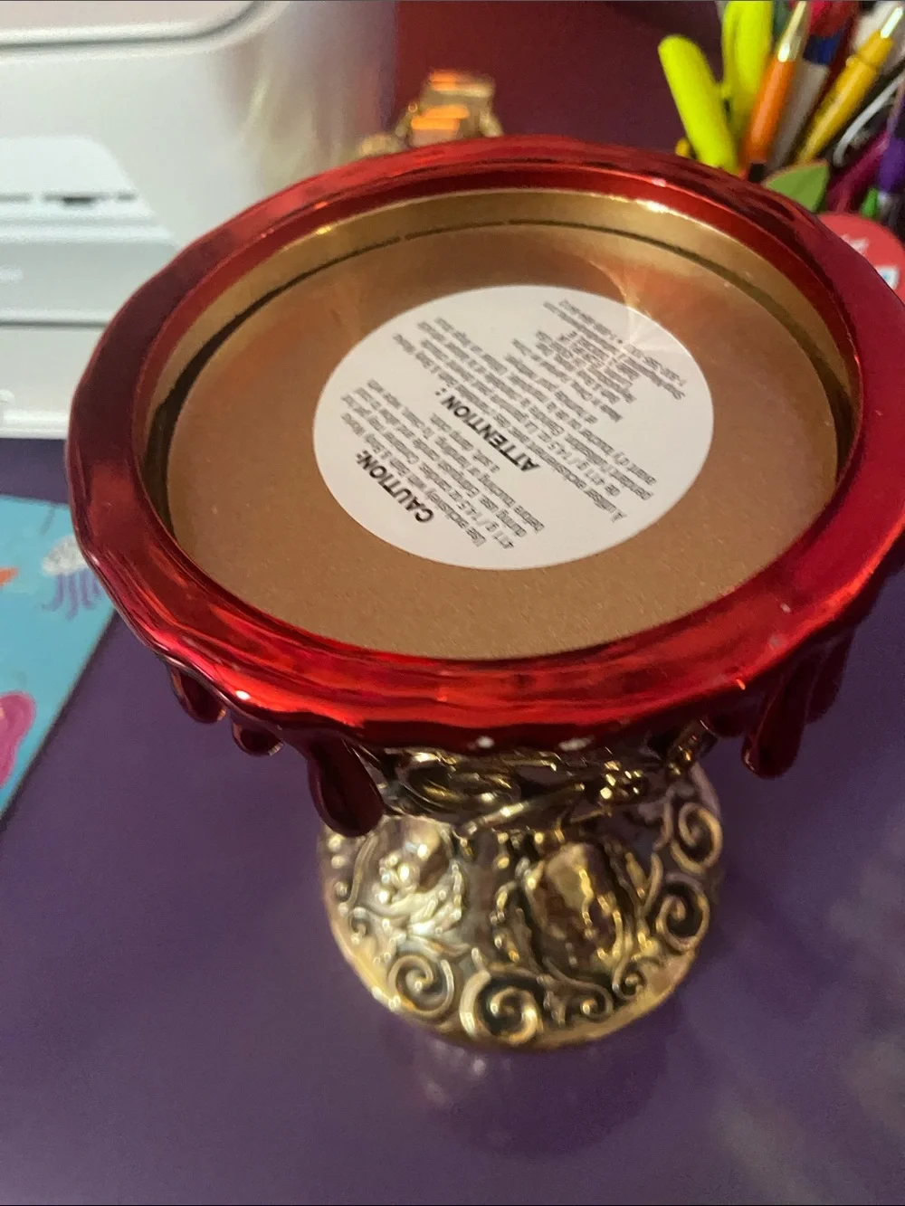 Ornate Gold Chalice Candle Holder with Red Drip Accent